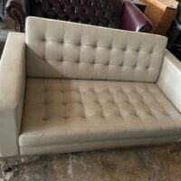 White Leather love seats